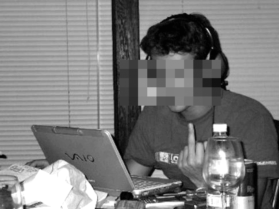 Archival 2004 developer runtime with pixelated identity censor and terminal setup
